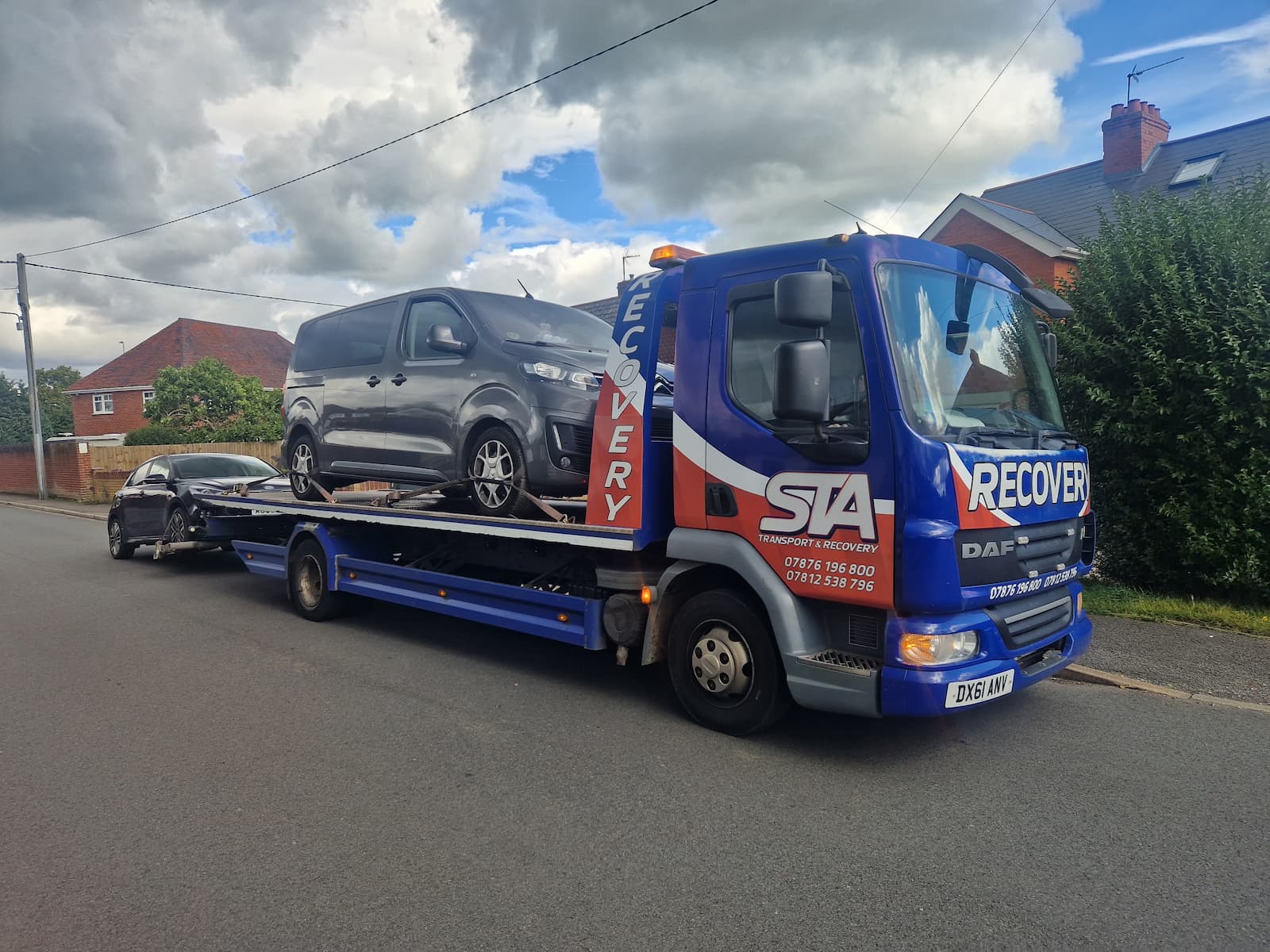 STA Transportation & Recovery flatbed truck